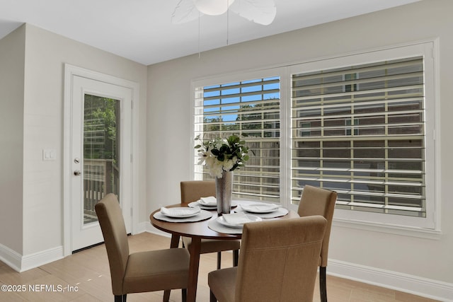 12847 Swamp Owl Ln, Jacksonville, FL 32258 - dining area featuring baseboards and ceiling fan