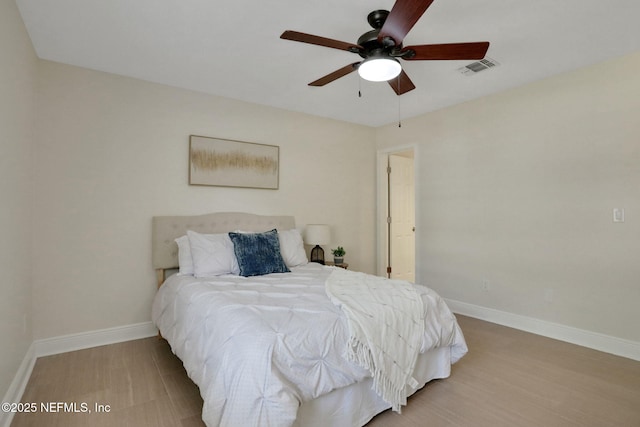 12847 Swamp Owl Ln, Jacksonville, FL 32258 - bedroom with baseboards and ceiling fan