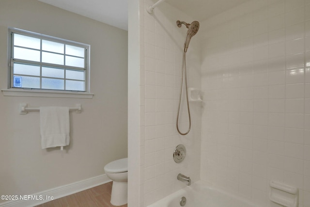 12847 Swamp Owl Ln, Jacksonville, FL 32258 - bathroom featuring toilet, baseboards, tub / shower combination, and wood finished floors