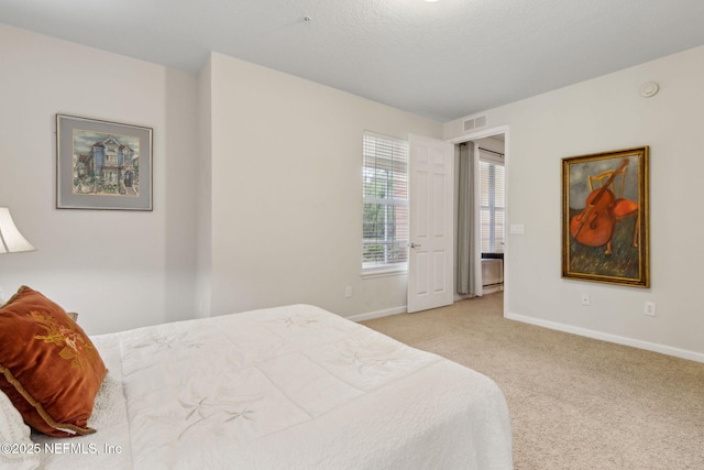 9831 Del Webb Pkwy Unit 3107, Jacksonville, FL 32256 - carpeted bedroom with visible vents and baseboards