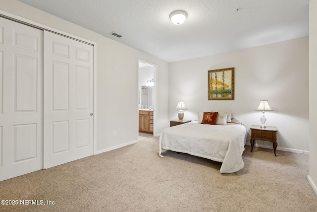 9831 Del Webb Pkwy Unit 3107, Jacksonville, FL 32256 - bedroom featuring a closet, baseboards, light colored carpet, and visible vents