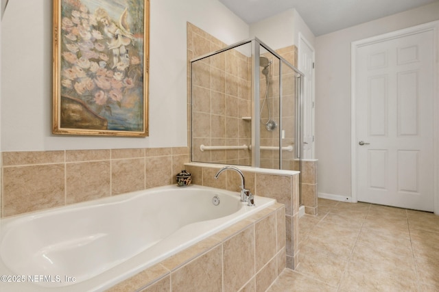 9831 Del Webb Pkwy Unit 3107, Jacksonville, FL 32256 - bathroom featuring a stall shower, a garden tub, and tile patterned flooring