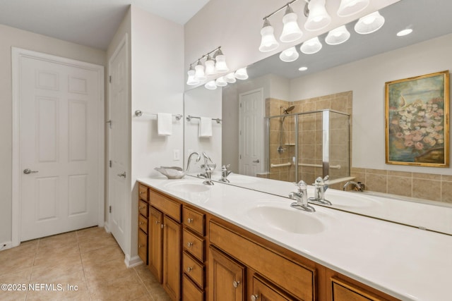 9831 Del Webb Pkwy Unit 3107, Jacksonville, FL 32256 - full bathroom with a sink, a shower stall, tile patterned flooring, and double vanity