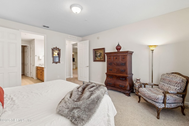 9831 Del Webb Pkwy Unit 3107, Jacksonville, FL 32256 - bedroom with visible vents, light colored carpet, and baseboards