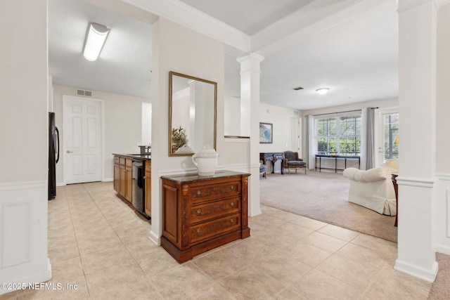 9831 Del Webb Pkwy Unit 3107, Jacksonville, FL 32256 - hallway featuring light tile patterned floors, visible vents, ornate columns, and light colored carpet