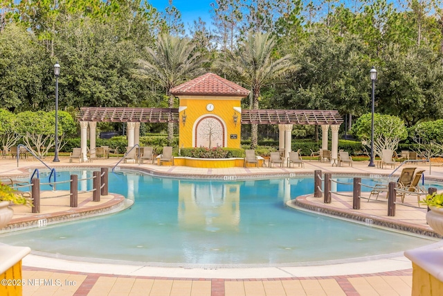 9831 Del Webb Pkwy Unit 3107, Jacksonville, FL 32256 - community pool with a pergola and a patio area