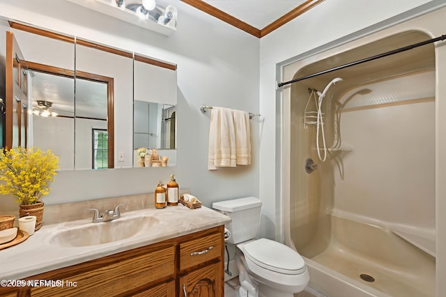 54223 Lisa Dr, Callahan, FL 32011 - bathroom featuring vanity, a shower, toilet, and ornamental molding