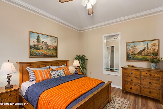 54223 Lisa Dr, Callahan, FL 32011 - bedroom featuring crown molding, wood finished floors, baseboards, and ceiling fan