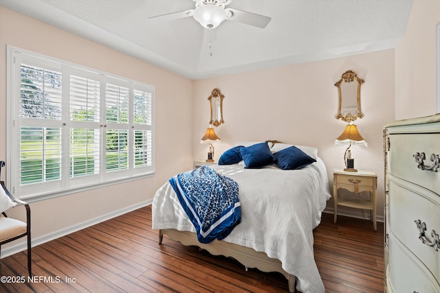 1952 Quaker Ridge Dr, Green Cove Springs, FL 32043 - bedroom with baseboards, ceiling fan, and wood finished floors