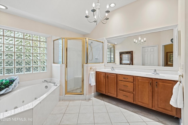 1952 Quaker Ridge Dr, Green Cove Springs, FL 32043 - bathroom with a chandelier, a sink, a stall shower, double vanity, and tile patterned floors