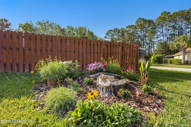 view of yard featuring fence