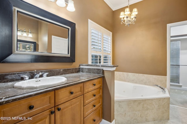 bathroom featuring vanity, a whirlpool tub, crown molding, and a chandelier
