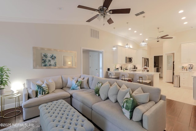 4394 Apple Tree Pl, Jacksonville, FL 32258 - living area with a ceiling fan, wood finished floors, crown molding, and visible vents