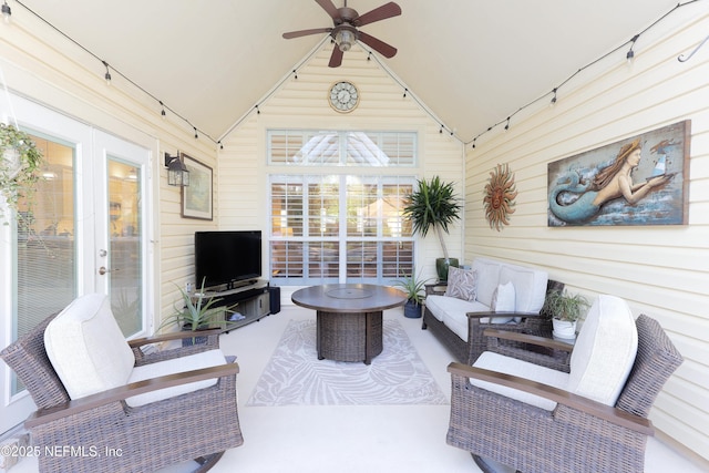 4394 Apple Tree Pl, Jacksonville, FL 32258 - living area with high vaulted ceiling, wood walls, and a ceiling fan
