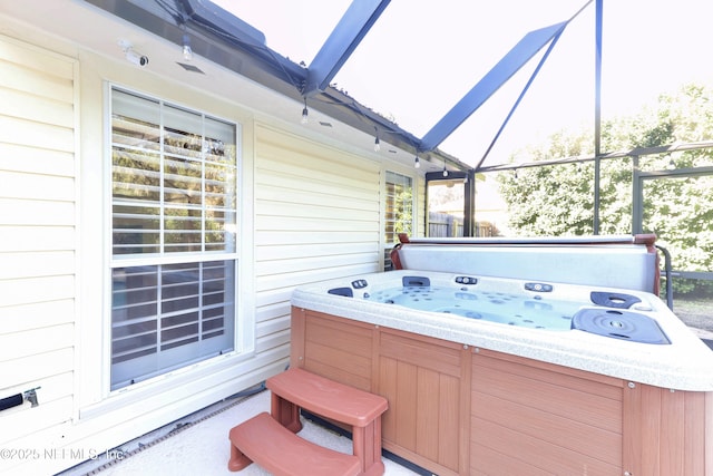 4394 Apple Tree Pl, Jacksonville, FL 32258 - view of patio with a lanai and a hot tub