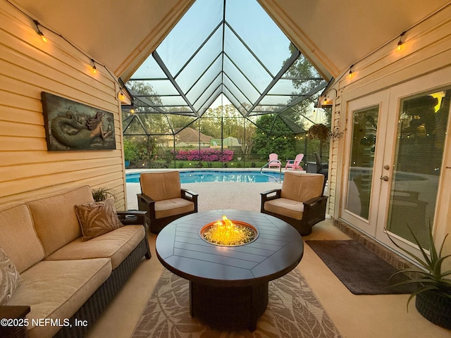 4394 Apple Tree Pl, Jacksonville, FL 32258 - view of patio featuring french doors, an outdoor living space with a fire pit, an outdoor pool, and a lanai