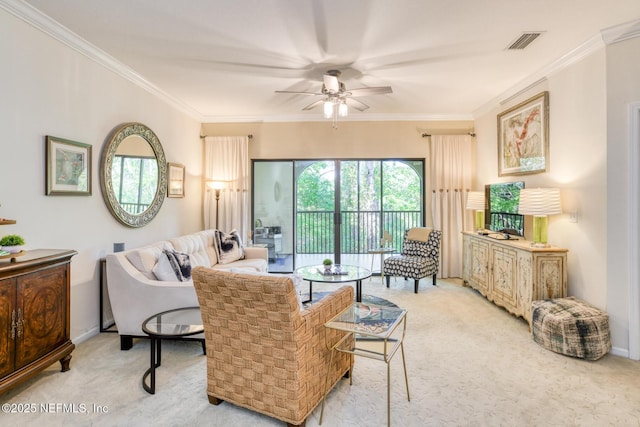 1825 Vista Cove Rd, Saint Augustine, FL 32084 - carpeted living area with a ceiling fan, crown molding, and baseboards