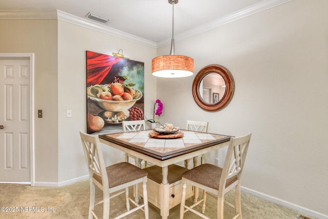 1825 Vista Cove Rd, Saint Augustine, FL 32084 - carpeted dining space featuring baseboards and ornamental molding