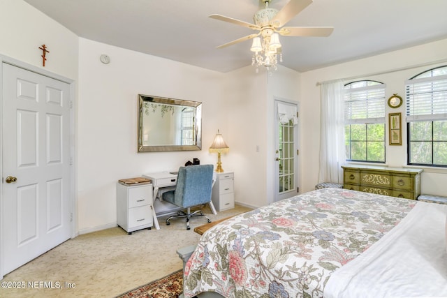 1825 Vista Cove Rd, Saint Augustine, FL 32084 - bedroom featuring light colored carpet, baseboards, a desk, and a ceiling fan