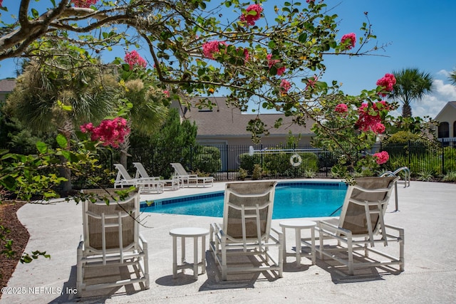 1825 Vista Cove Rd, Saint Augustine, FL 32084 - community pool with a patio area and fence