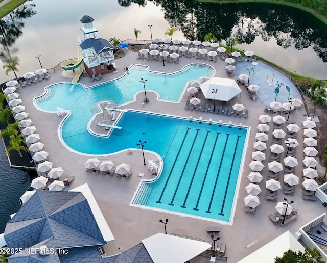 1625 Pinecrest Dr, Fleming Island, FL 32003 - community pool with a water slide and a patio area