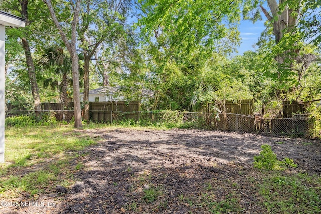 view of yard with fence