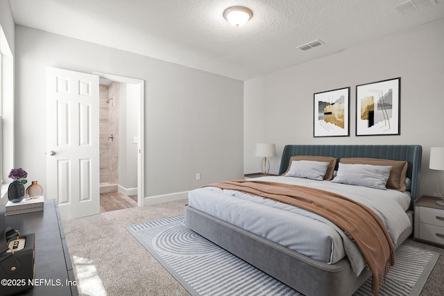 bedroom with baseboards, visible vents, carpet floors, and a textured ceiling