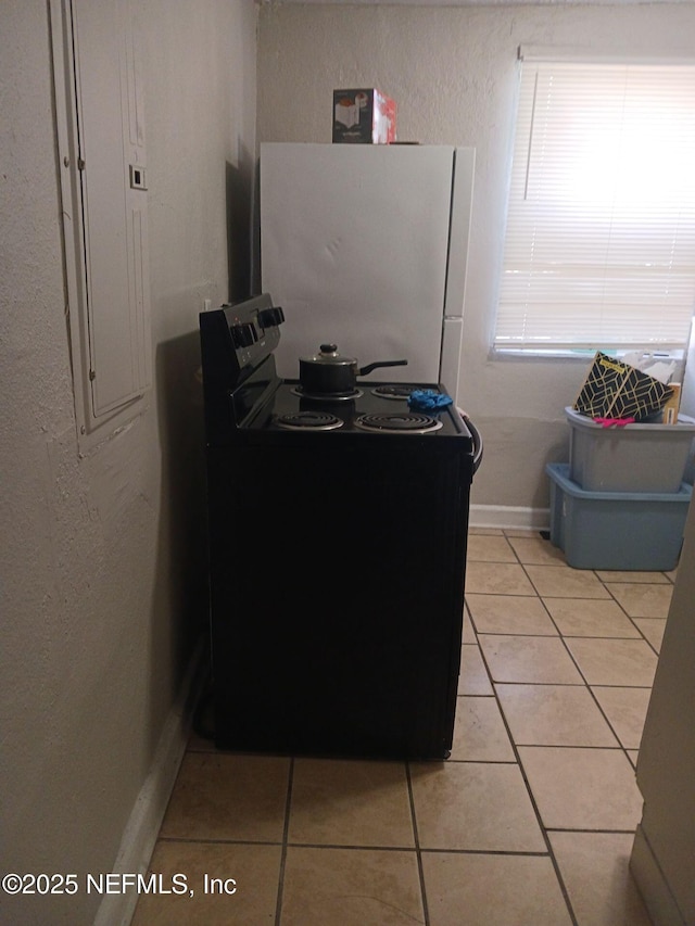 1419 Brady St Unit 1-2, Jacksonville, FL 32209 - interior space with baseboards, a textured wall, and light tile patterned floors