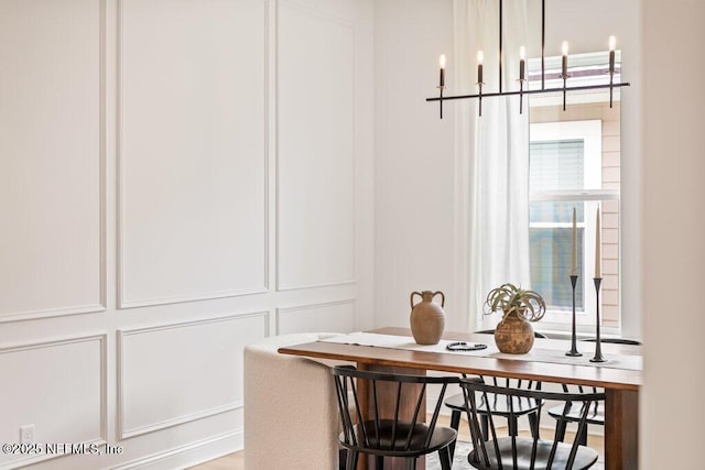 dining room with a chandelier