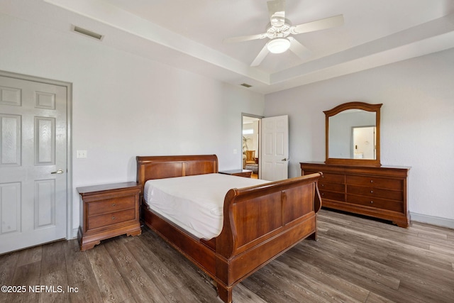 132 Beachside Dr, Ponte Vedra Beach, FL 32082 - bedroom featuring visible vents, ceiling fan, wood finished floors, and a raised ceiling