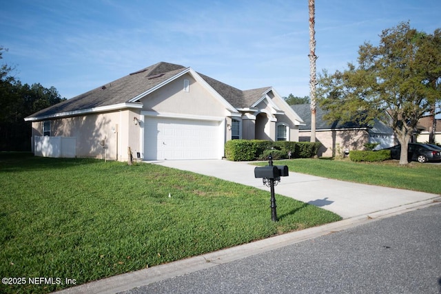 ranch-style house featuring a front yard, driveway, stucco siding, and an attached garage