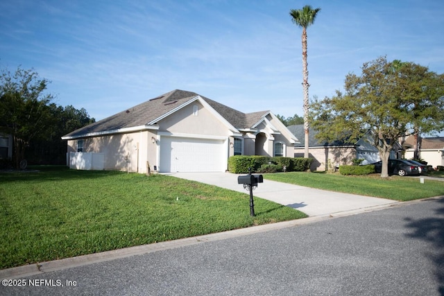 single story home with a garage, a front yard, driveway, and stucco siding
