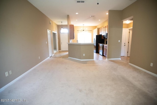 unfurnished living room with visible vents, baseboards, recessed lighting, and light carpet