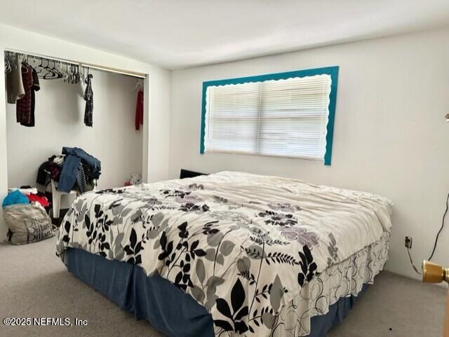 3547 Ring Ln, Jacksonville, FL 32207 - bedroom featuring carpet and a closet