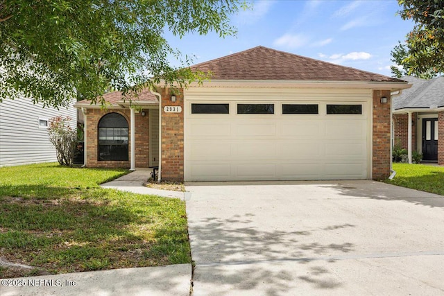 2931 Lantana Lakes Dr W, Jacksonville, FL 32246 - ranch-style house with a shingled roof, a garage, a front lawn, and concrete driveway
