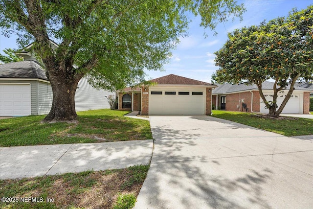 2931 Lantana Lakes Dr W, Jacksonville, FL 32246 - ranch-style house with brick siding, a front yard, driveway, and a garage