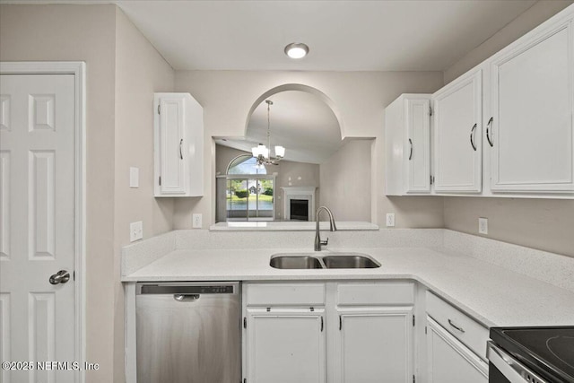 2931 Lantana Lakes Dr W, Jacksonville, FL 32246 - kitchen featuring white cabinetry, a sink, stainless steel appliances, and a chandelier