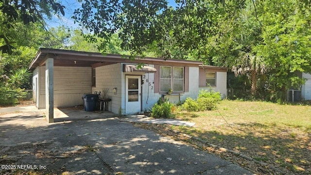 2652 Townsend Blvd, Jacksonville, FL 32211 - view of outbuilding featuring aphalt driveway