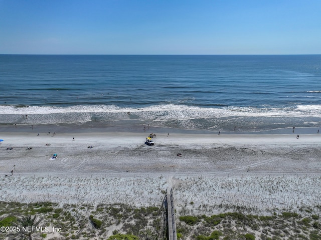 property view of water featuring a beach view