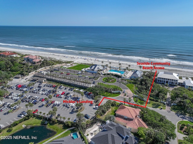 aerial view with a view of the beach and a water view