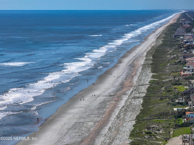 property view of water featuring a beach view