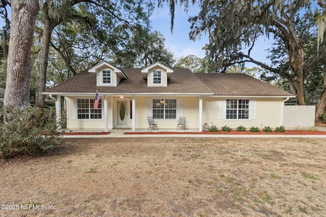 96033 River Marsh Bnd, Fernandina Beach, FL 32034 - view of front of home featuring a porch and roof with shingles