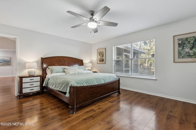96033 River Marsh Bnd, Fernandina Beach, FL 32034 - bedroom with baseboards, wood finished floors, and a ceiling fan