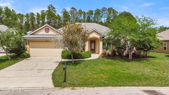 420 Chattan Way, Saint Johns, FL 32259 - obstructed view of property featuring an attached garage, concrete driveway, a front yard, and stucco siding