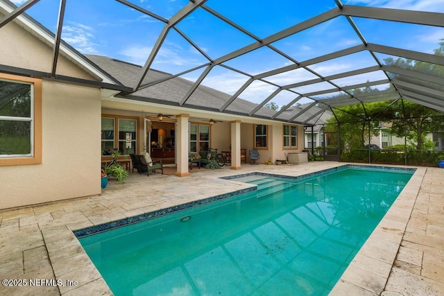 420 Chattan Way, Saint Johns, FL 32259 - outdoor pool featuring a patio area, ceiling fan, and glass enclosure