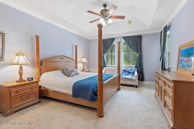 420 Chattan Way, Saint Johns, FL 32259 - bedroom featuring ornamental molding, a textured ceiling, a tray ceiling, ceiling fan, and light colored carpet