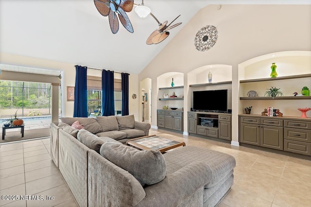 420 Chattan Way, Saint Johns, FL 32259 - living room with built in features, high vaulted ceiling, arched walkways, a ceiling fan, and light tile patterned flooring