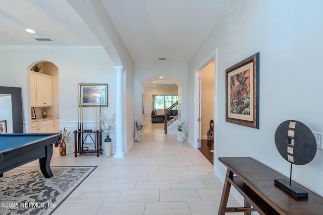 interior space with arched walkways, pool table, recessed lighting, and baseboards