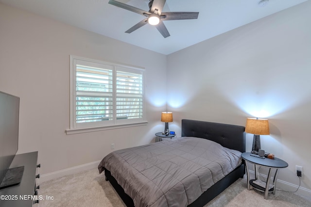 bedroom with baseboards, ceiling fan, and carpet flooring