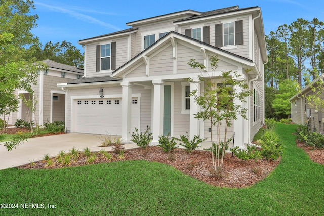 75 Mallow Ct, Saint Johns, FL 32259 - traditional-style house featuring concrete driveway, an attached garage, covered porch, and a front lawn